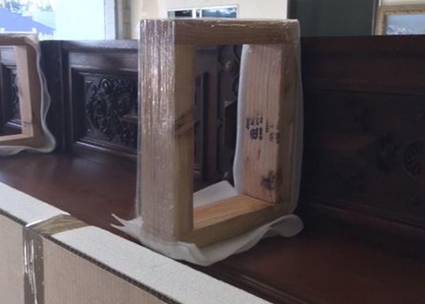 adding custom structure in place on furniture to hold antique furniture for shipping