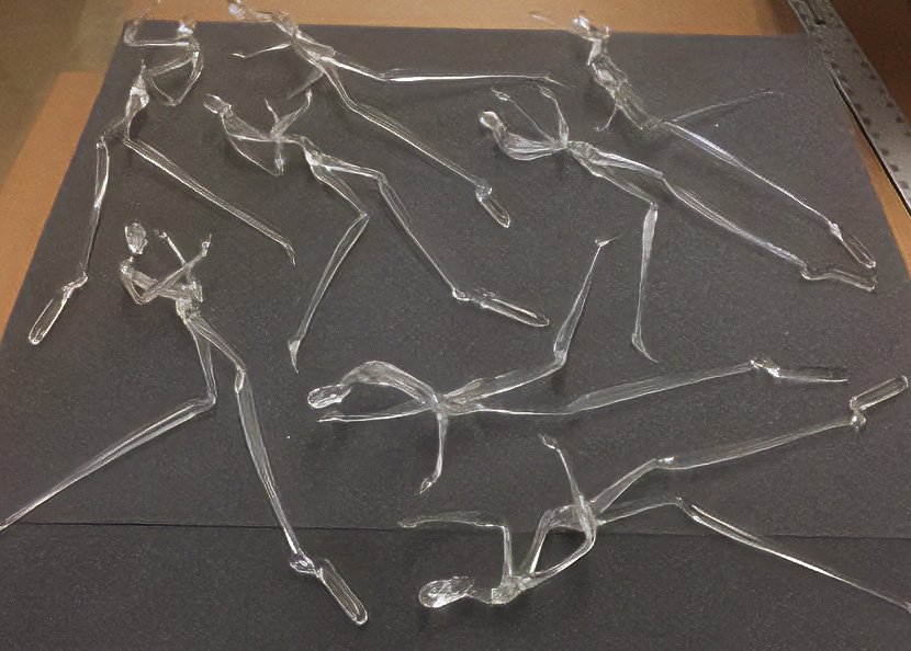 a group of delicate glass figurines on a foam to be cut our for custom protection
